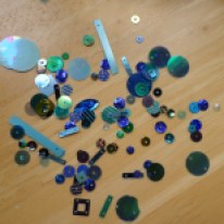 Assortment of blue sequins. Photo by Kath Howard (2014)